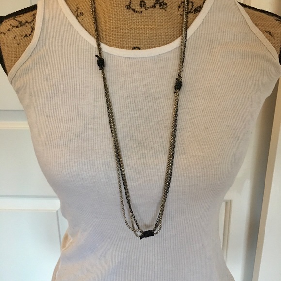 Long multi chain necklace with leather accent. - Picture 1 of 5
